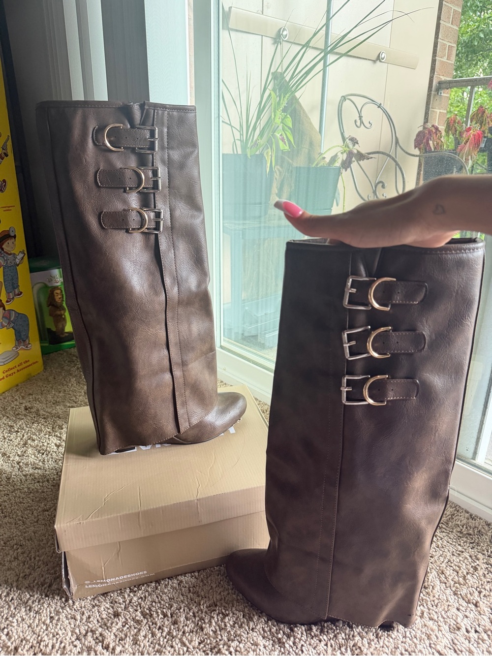 Brown fold over shark boots with gold and silver hardware. With box